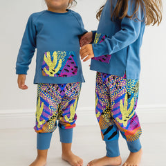 Child wearing the Raomio Blue Cactus kids loungewear set