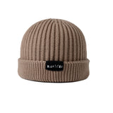 Soft Light Beige organic cotton beanie, unisex design, one size fits all, combining neutral tones with sustainable fashion.