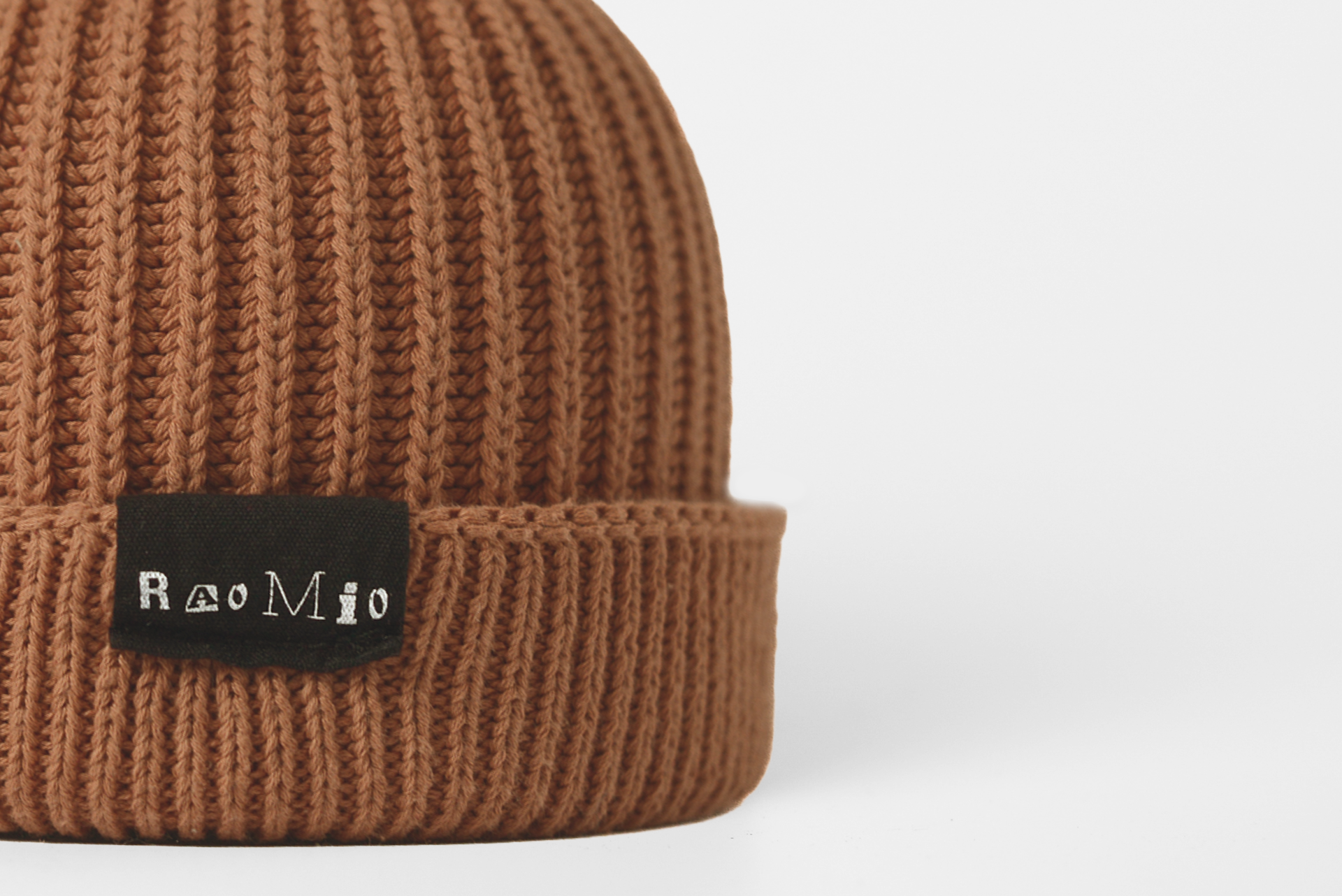 Warm Dark Sienna organic cotton beanie, unisex design, one size fits all, offering a cozy and eco-friendly accessory.