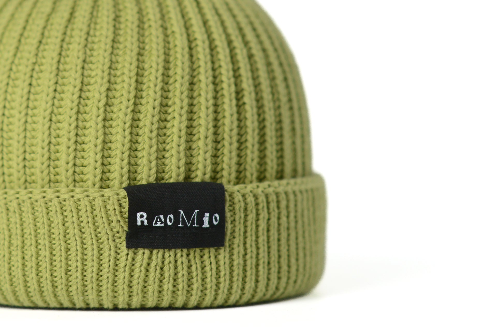 Sustainable light green organic cotton beanie, unisex and one size fits all, perfect for adding color to your eco-conscious wardrobe.