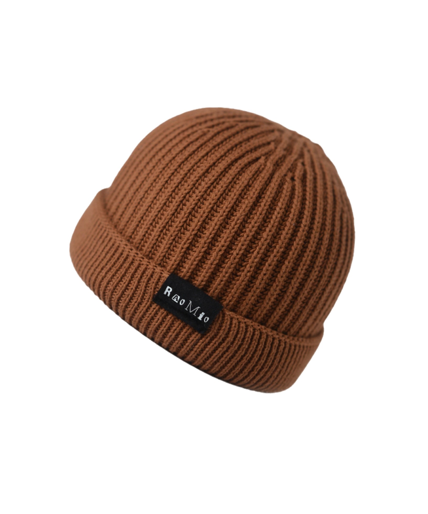 Warm ladrillo (brick) colored organic cotton beanie, crafted for eco-friendly fashion and cozy comfort.