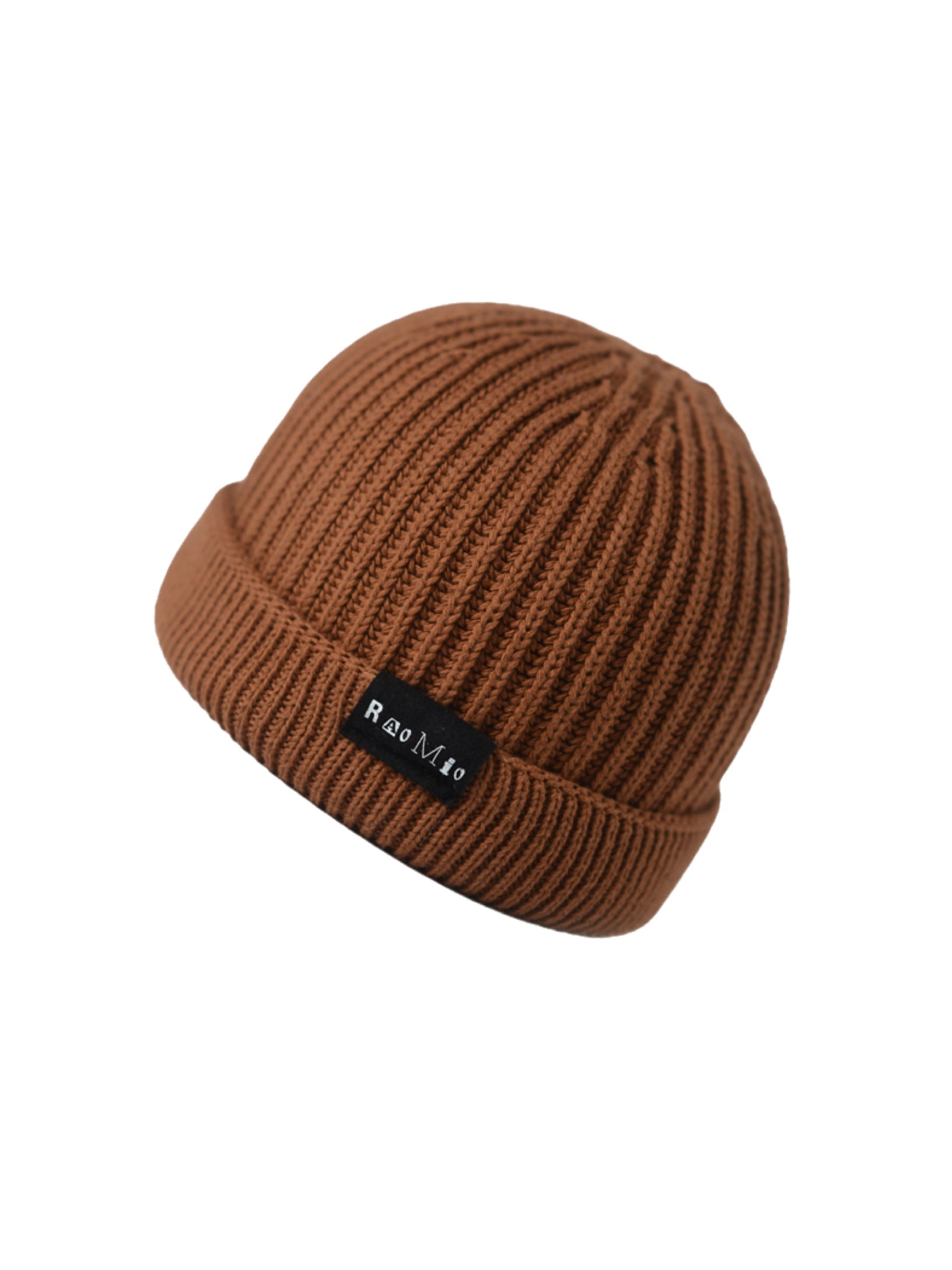 Warm ladrillo (brick) colored organic cotton beanie, crafted for eco-friendly fashion and cozy comfort.