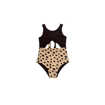 Girls one-piece swimsuit in Wild Dot print, black dots on beige, by Raomio