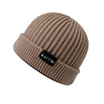 Unisex natural 100% cotton beanie featuring the Raomio logo, designed for comfort and sustainability.